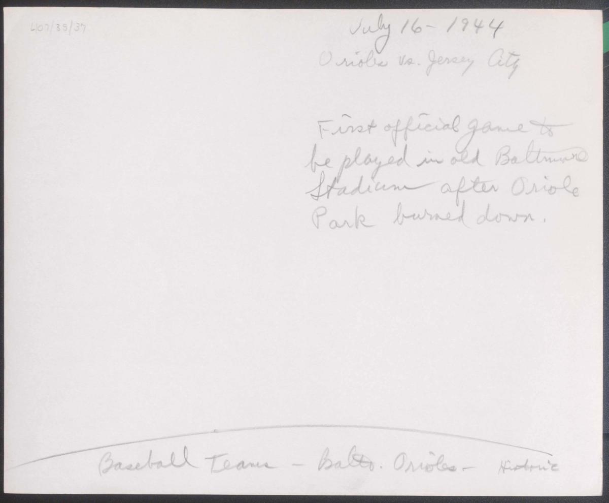 Handwritten caption on the back of a photo describing the Orioles’ July 16, 1944 game after Oriole Park burned down.
