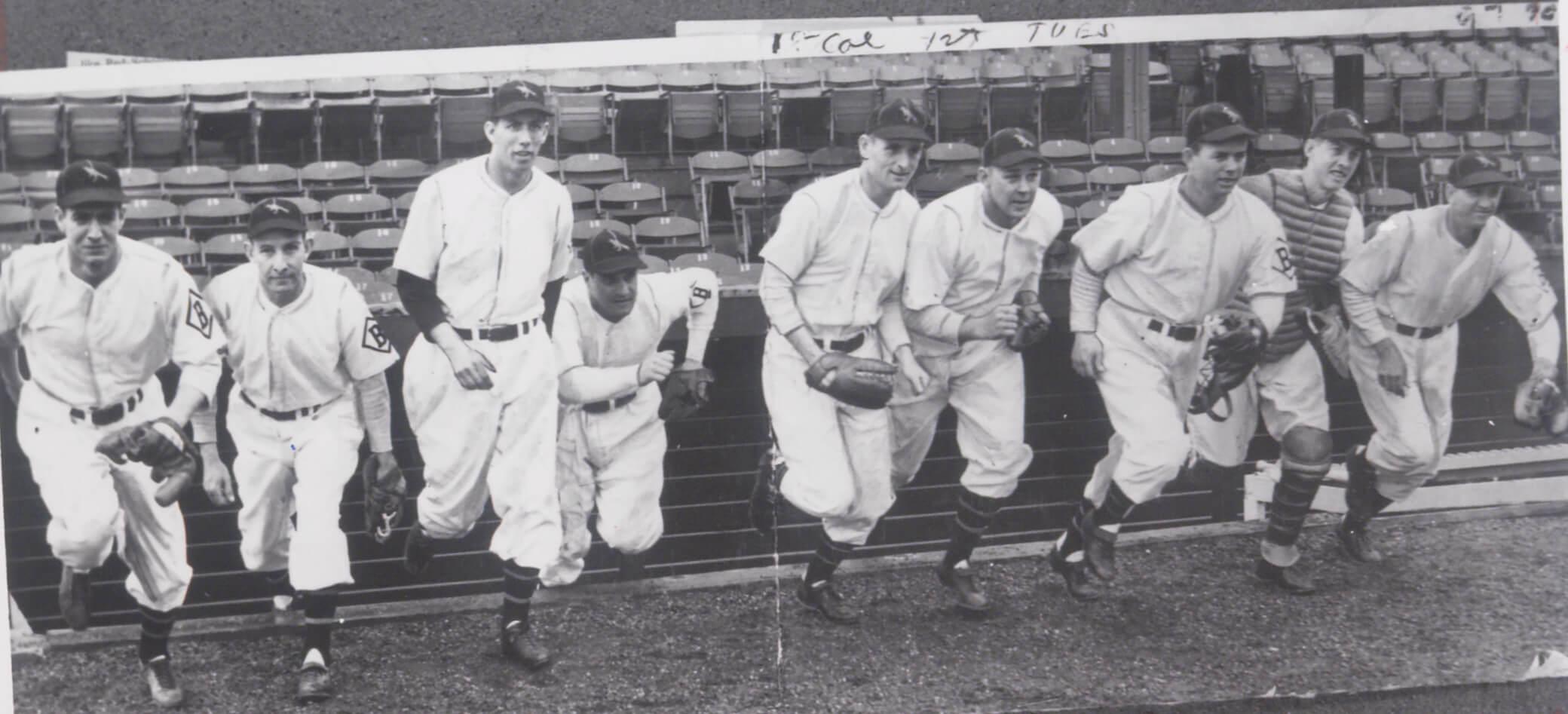 Players jogging out of the dugout