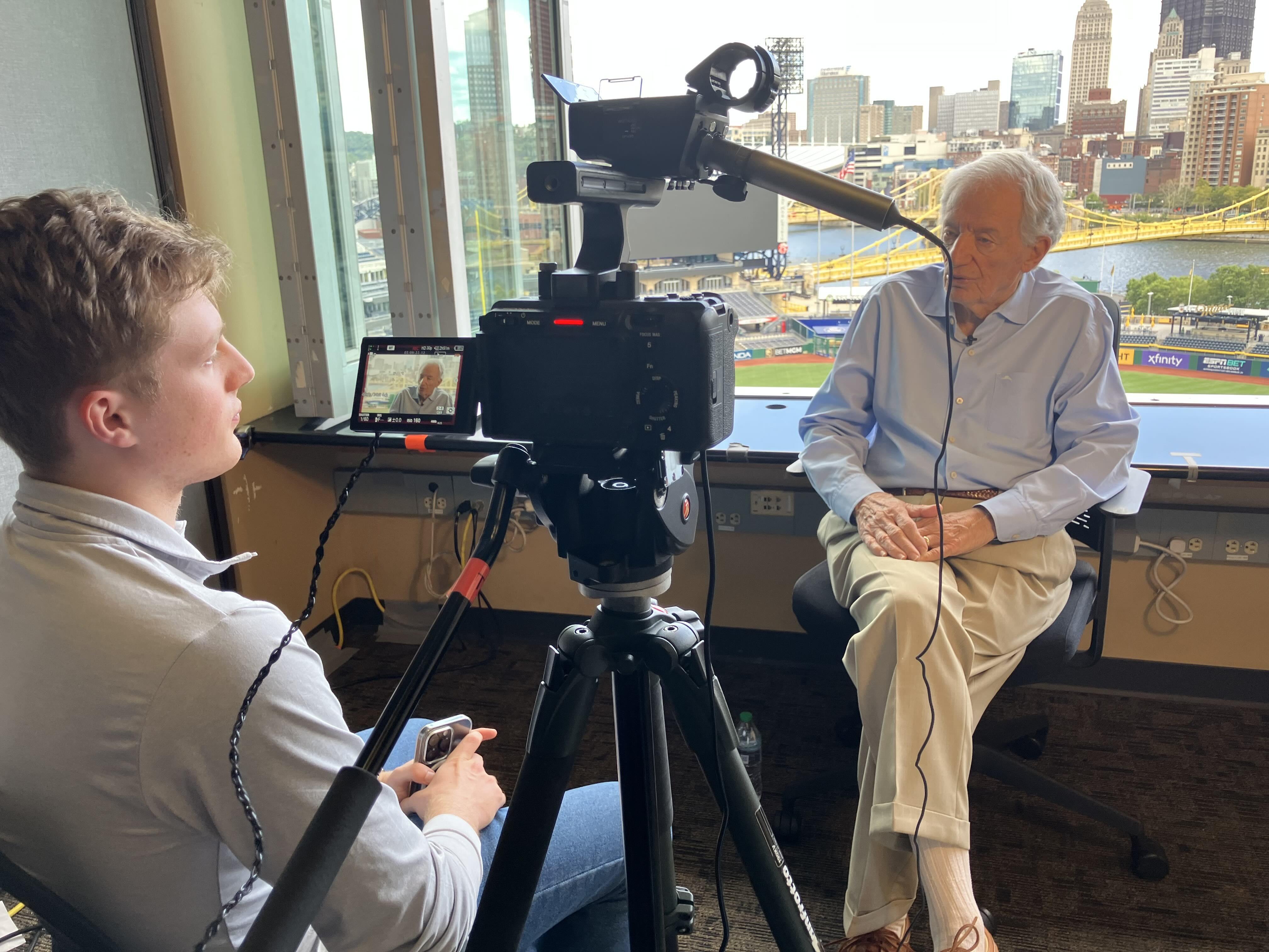 Student interviewing Frank Lucchino