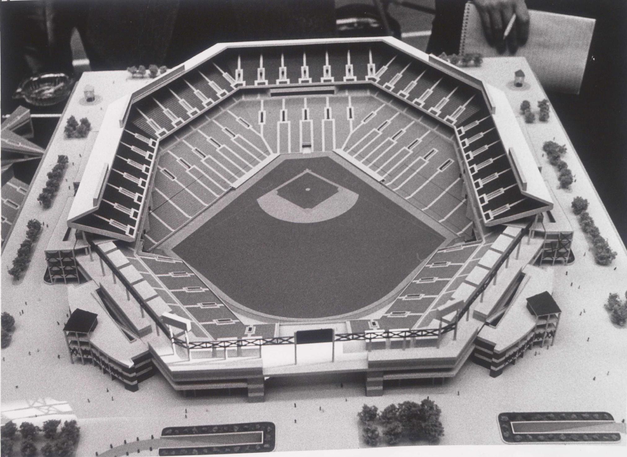 Black and white photo of an architectural model of the proposed Camden Yards baseball stadium showing the field and surrounding seating