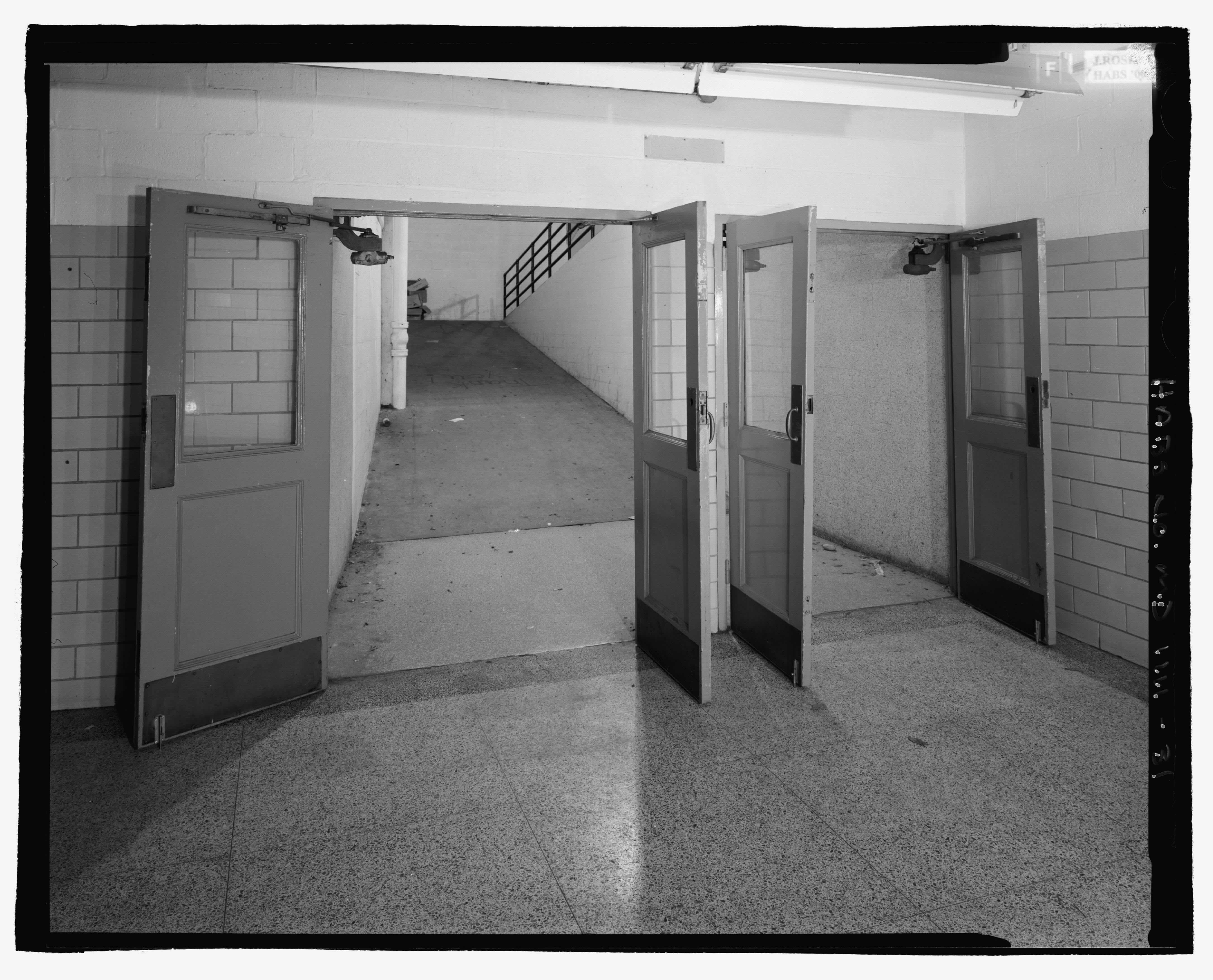 Interior hallway with open double doors