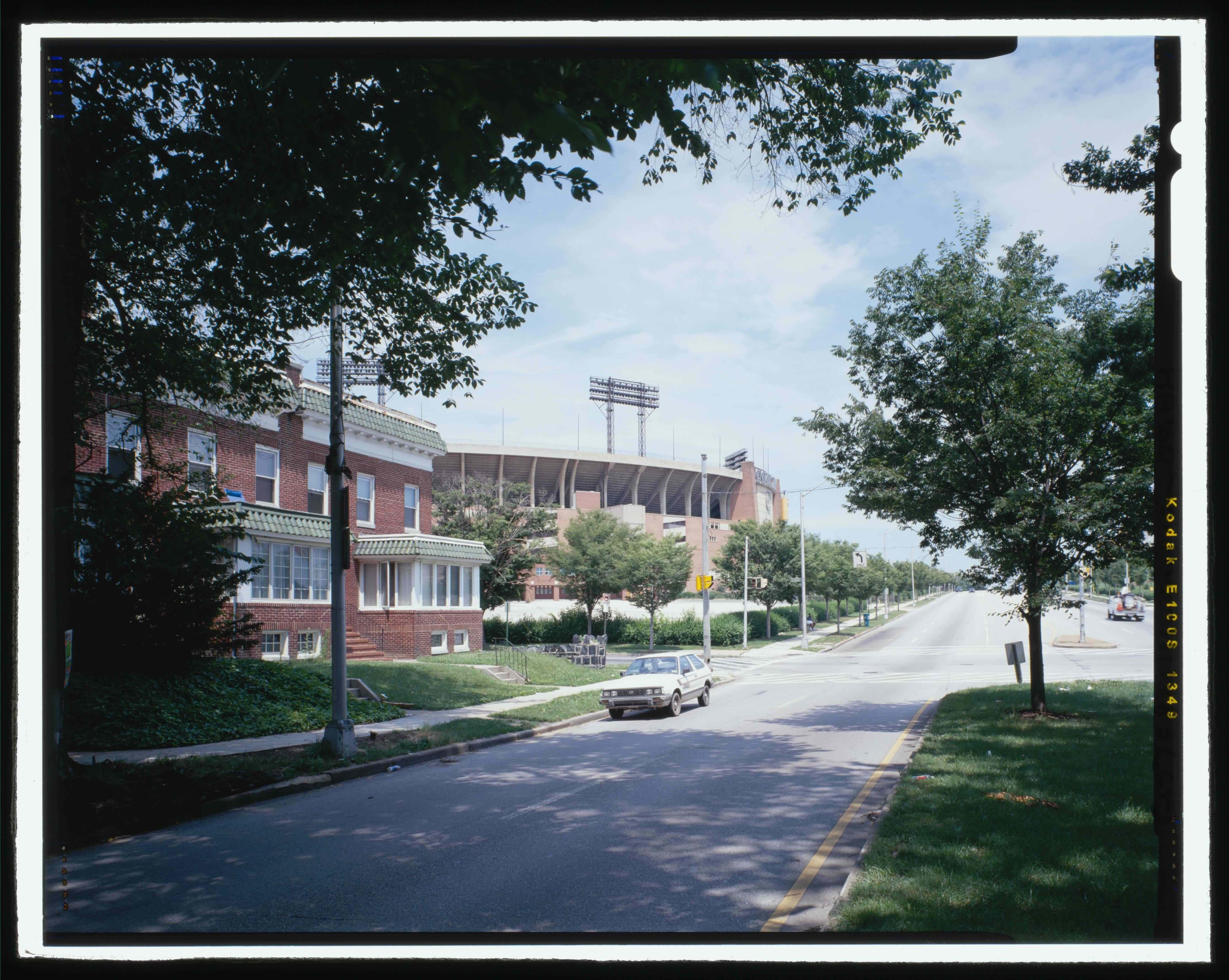 Street view of a residential block with Memorial Stadium